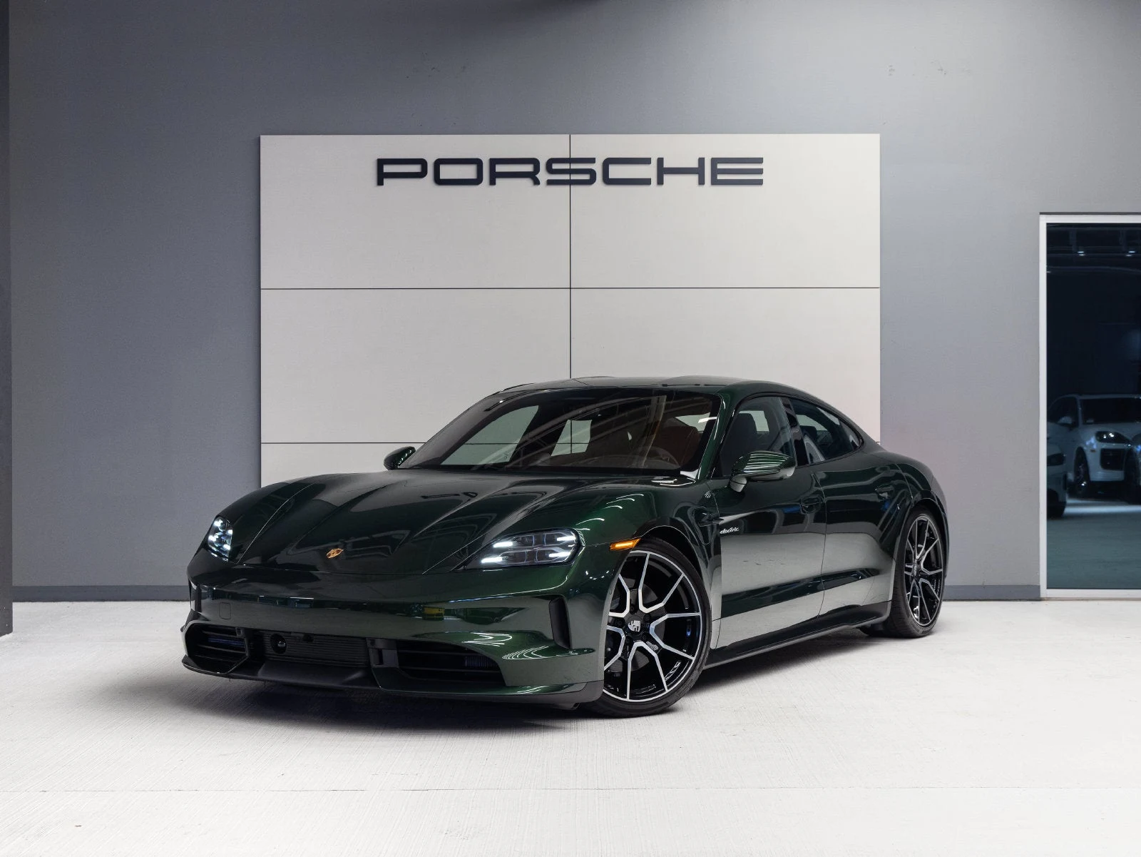Porsche Taycan 4 Sedan (2025 Update) · Oak Green Metallic Neo · Indigo Auto Group