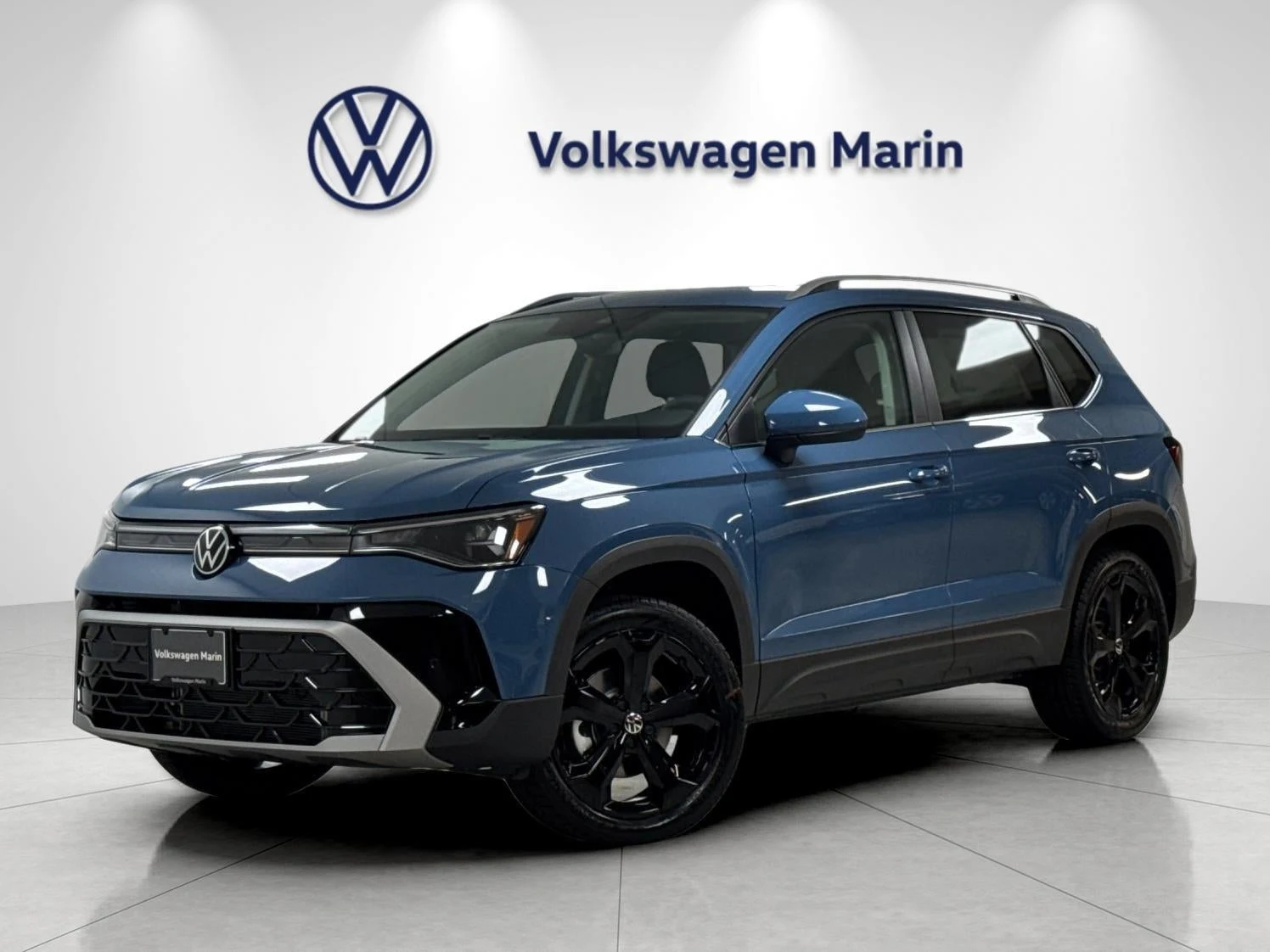 Volkswagen Taos SEL (2025 Update) · Monterey Blue Pearl · Indigo Auto Group