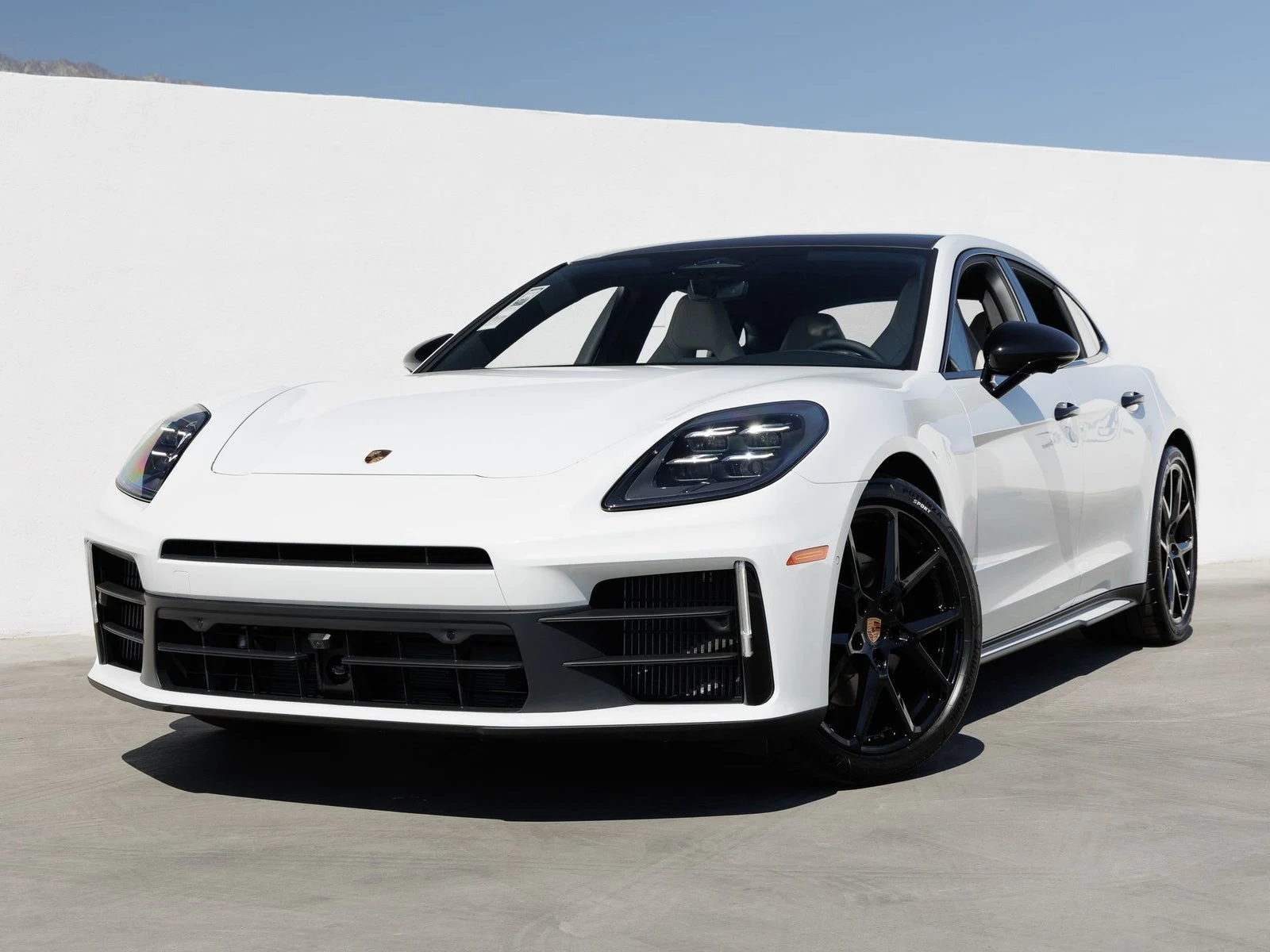 Porsche Panamera (976) · Carrara White Metallic · Indigo Auto Group