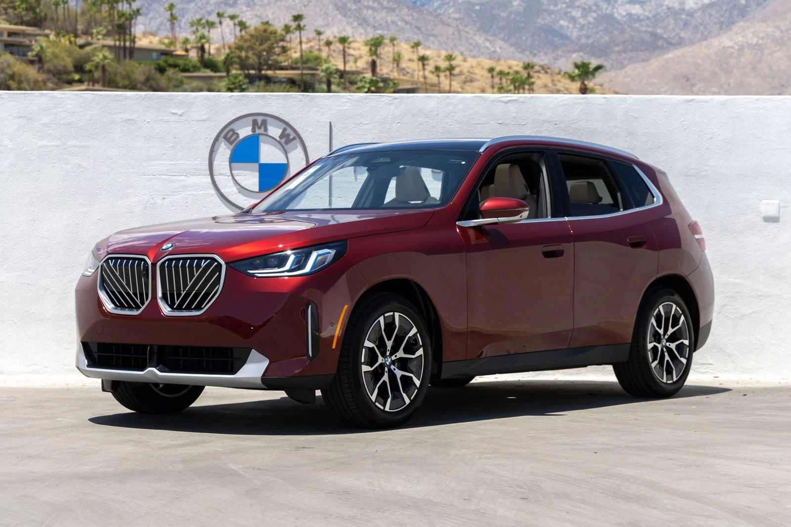 BMW X3 30 xDrive (G45) · Ruby Red II Metallic · Indigo Auto Group