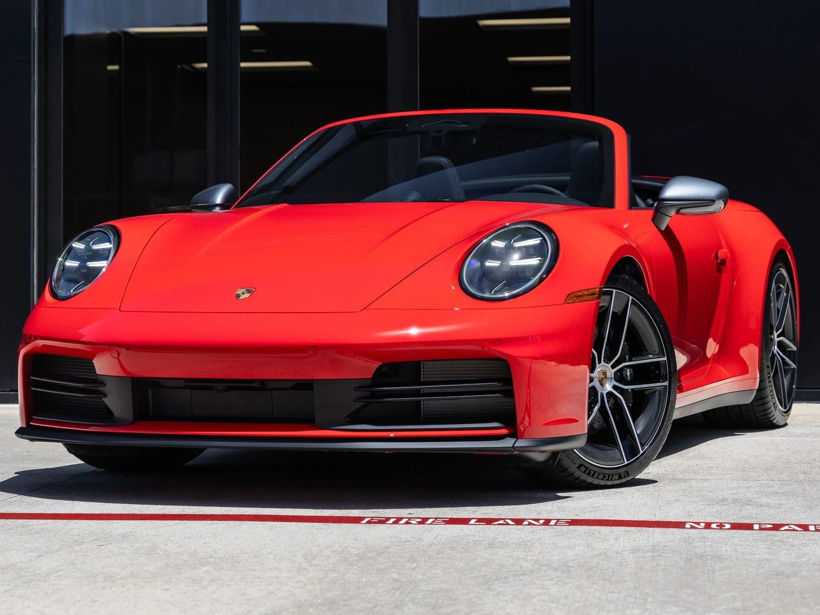 Porsche 911 Carrera T Cabriolet (992.2) · Guards Red · Indigo Auto Group