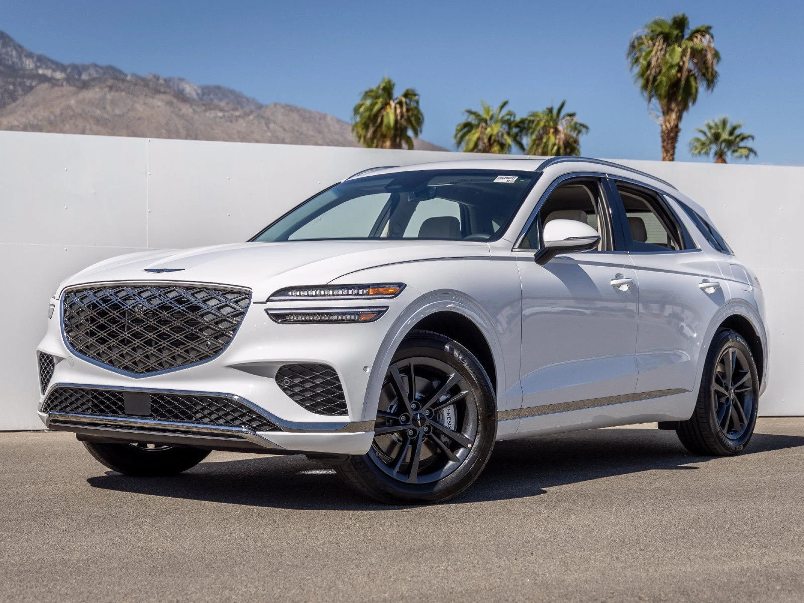 Genesis GV70 2.5T Advanced (2024 Update) · Alta White · Indigo Auto Group