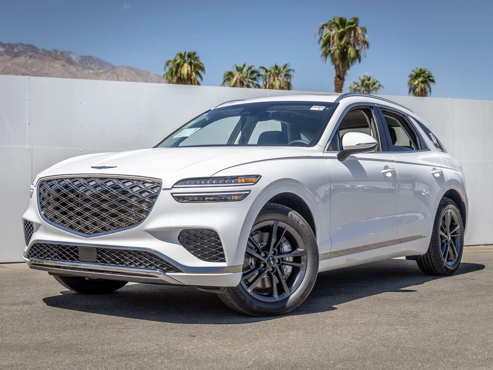 Genesis GV70 2.5T Select (2024 Update) · Alta White · Indigo Auto Group