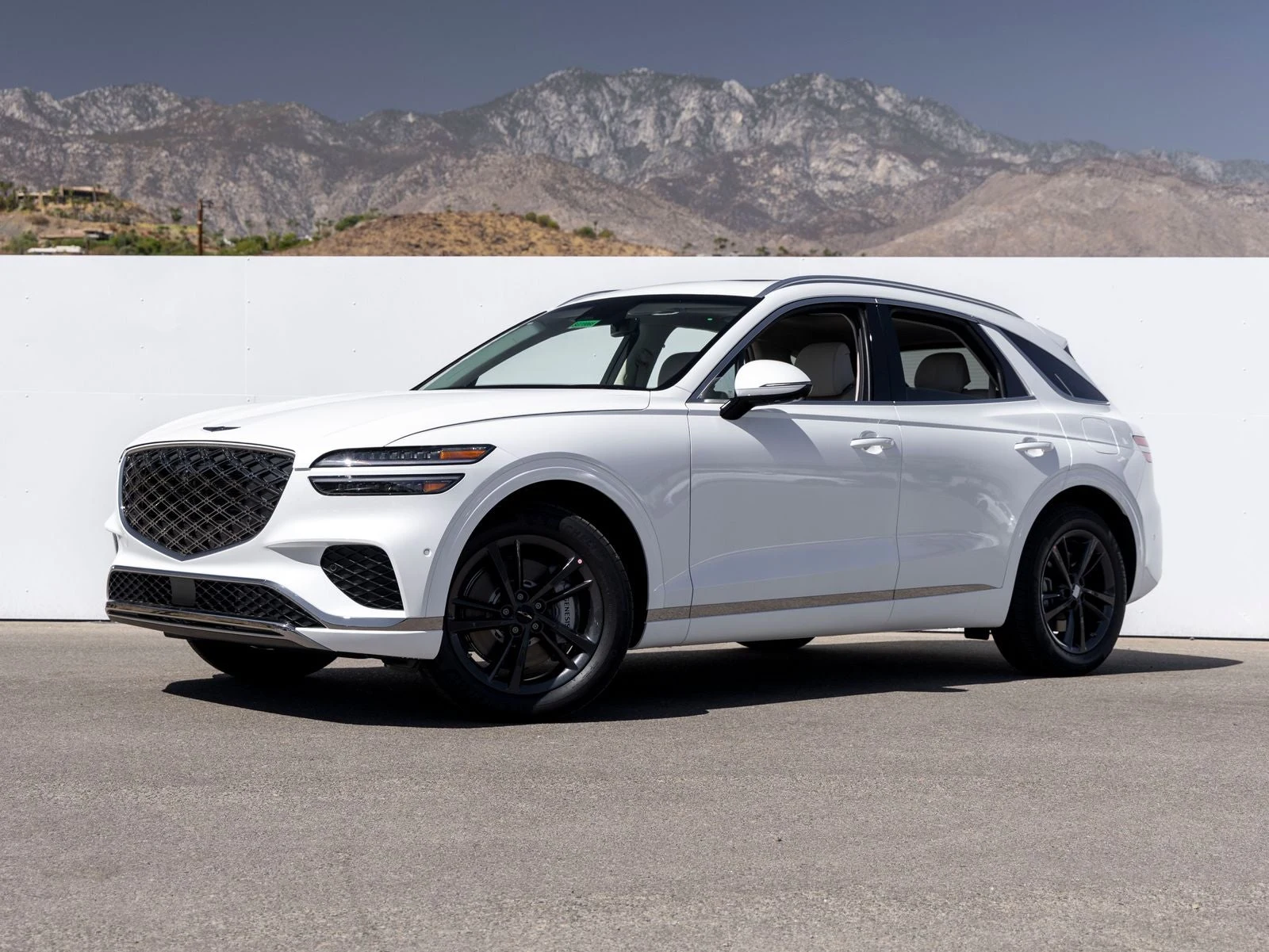 Genesis GV70 2.5T Advanced (2024 Update) · Uyuni White · Indigo Auto Group