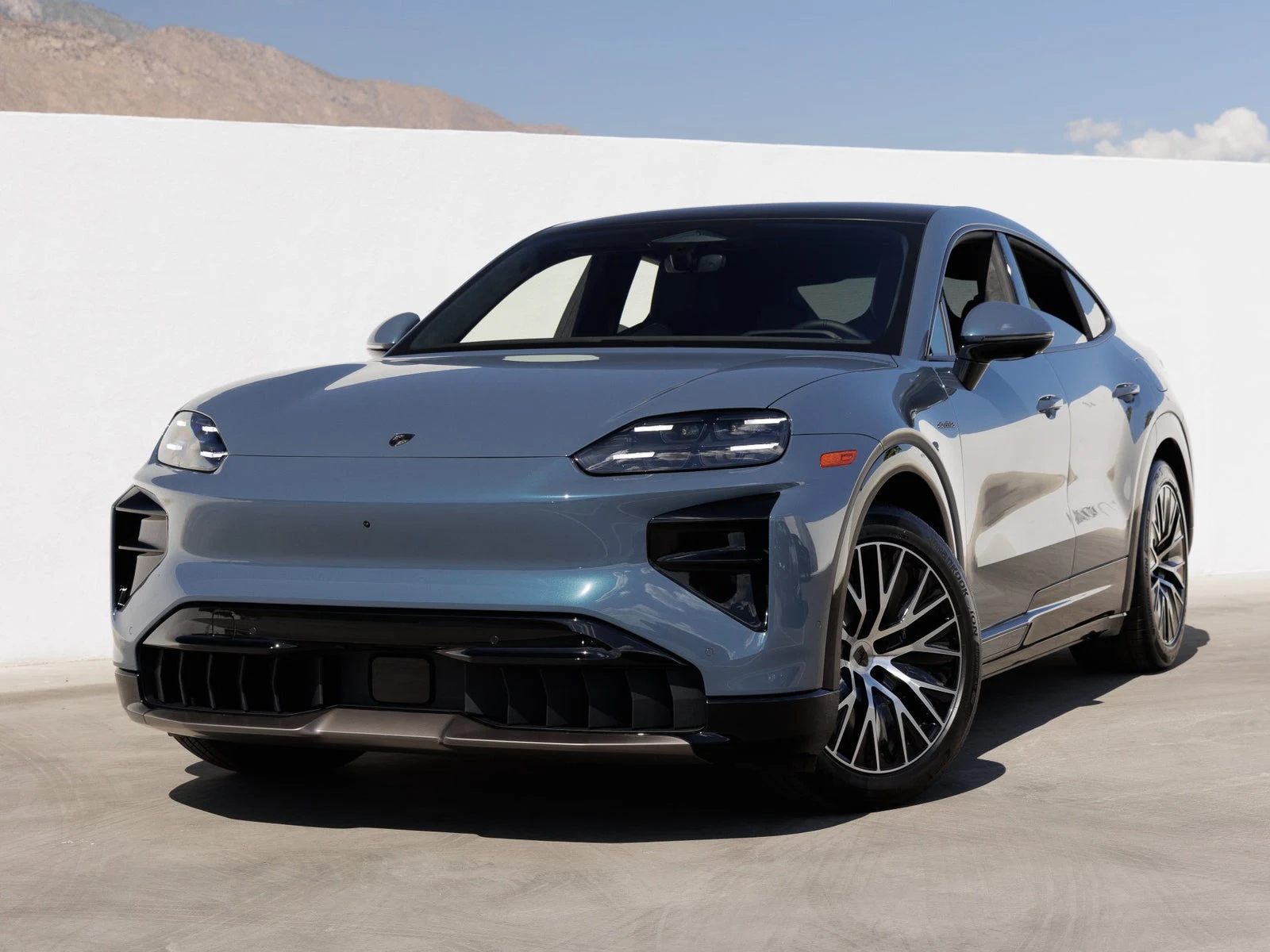 Porsche Cayenne Turbo Coupé Electric (E4) · Pale Blue Metallic · Indigo Auto Group