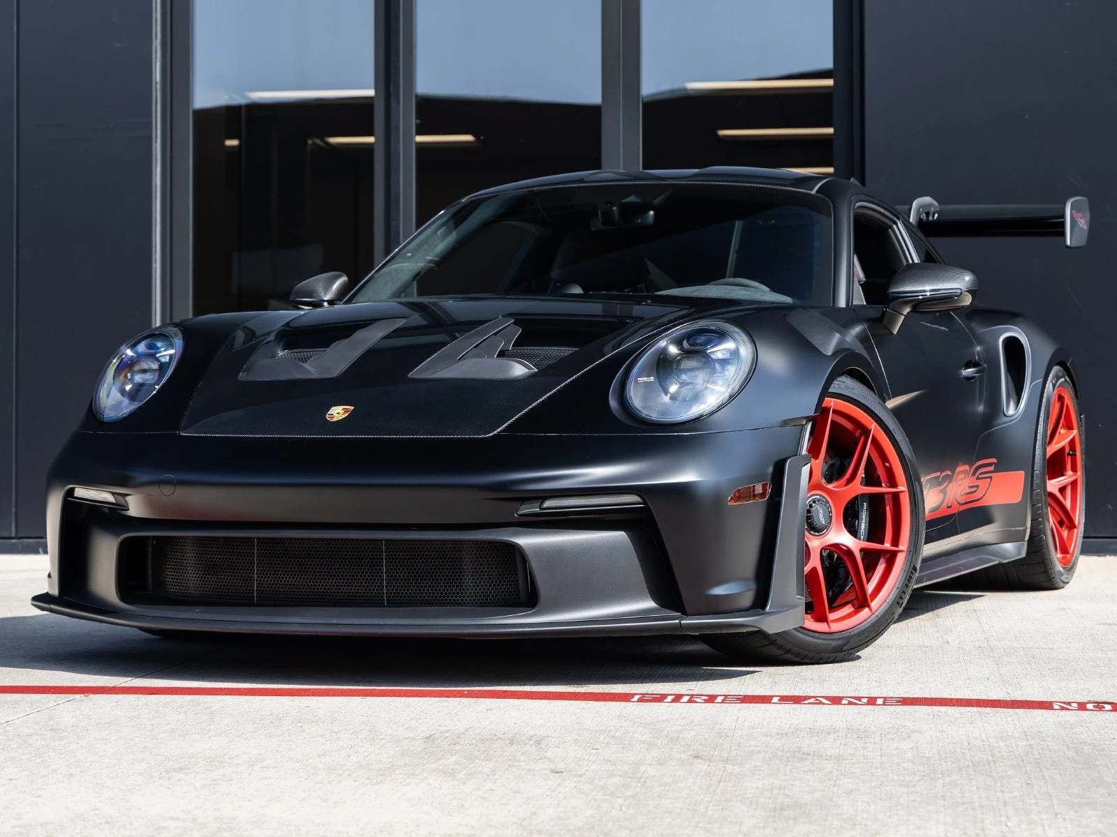 Porsche 911 GT3 RS (992.1) · black · Indigo Auto Group