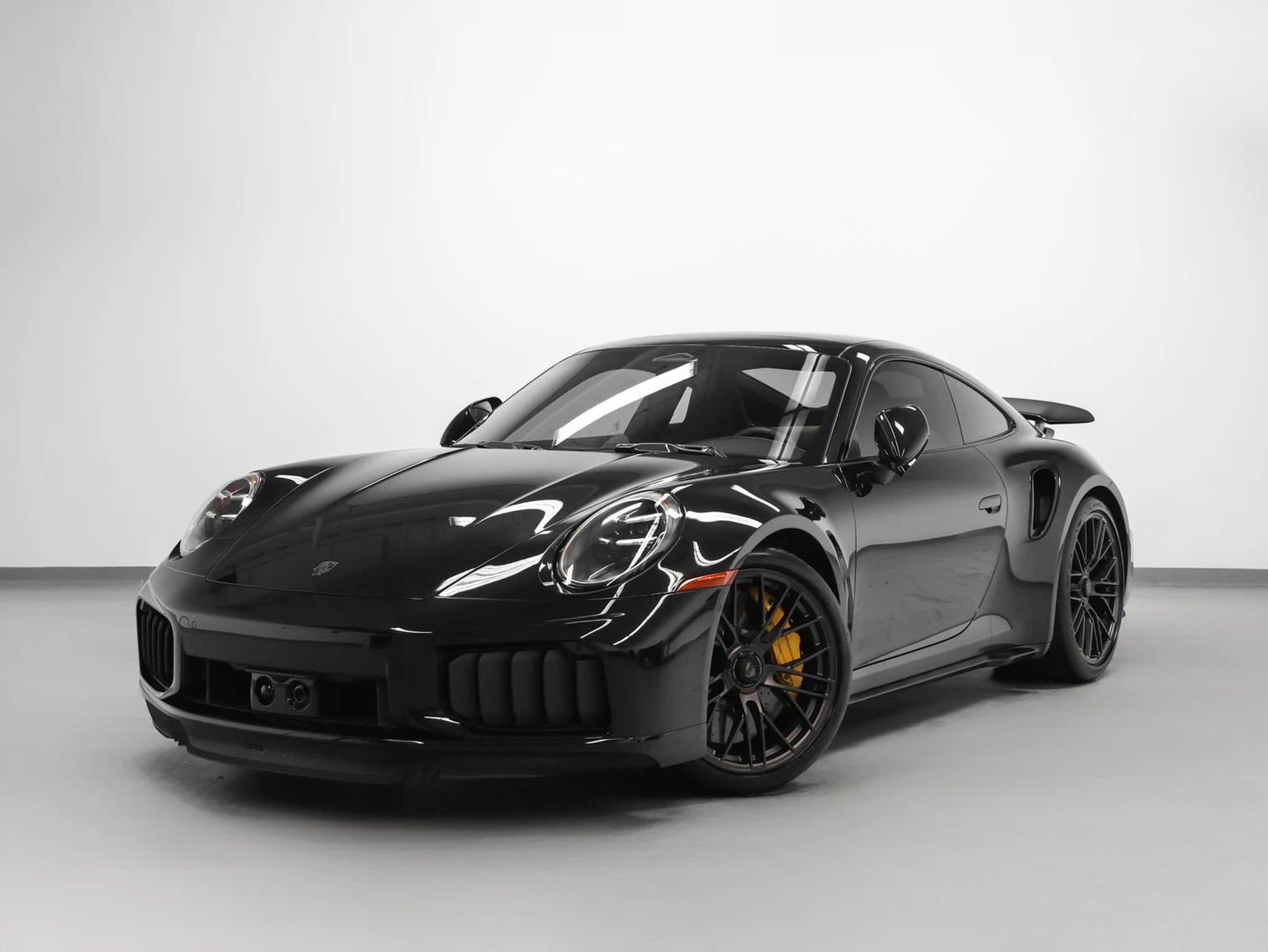 Porsche 911 Turbo S (992.2) · Jet Black Metallic · Indigo Auto Group