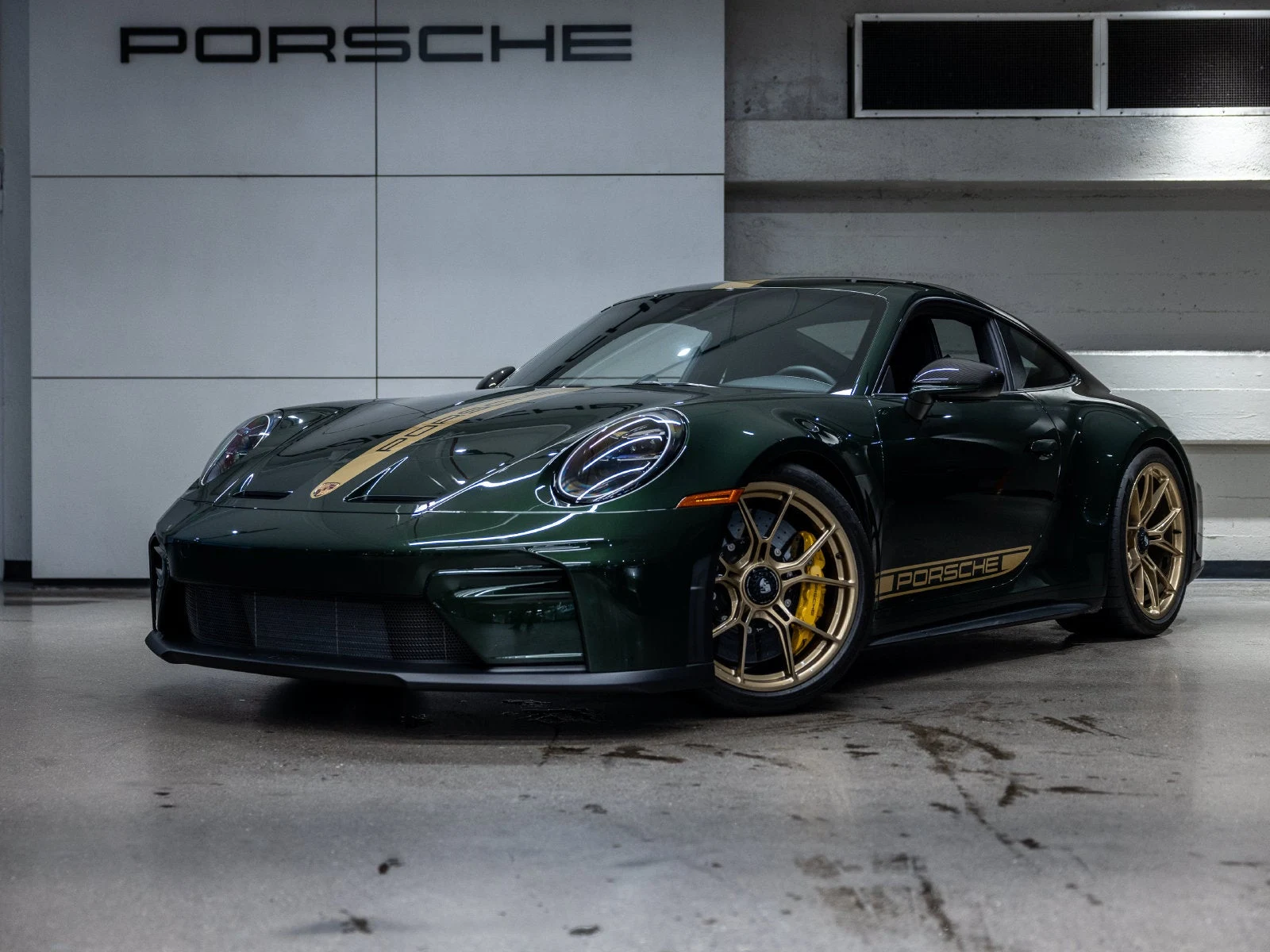 Porsche 911 GT3 Touring (992.2) · Oak Green Metallic Neo · Indigo Auto Group