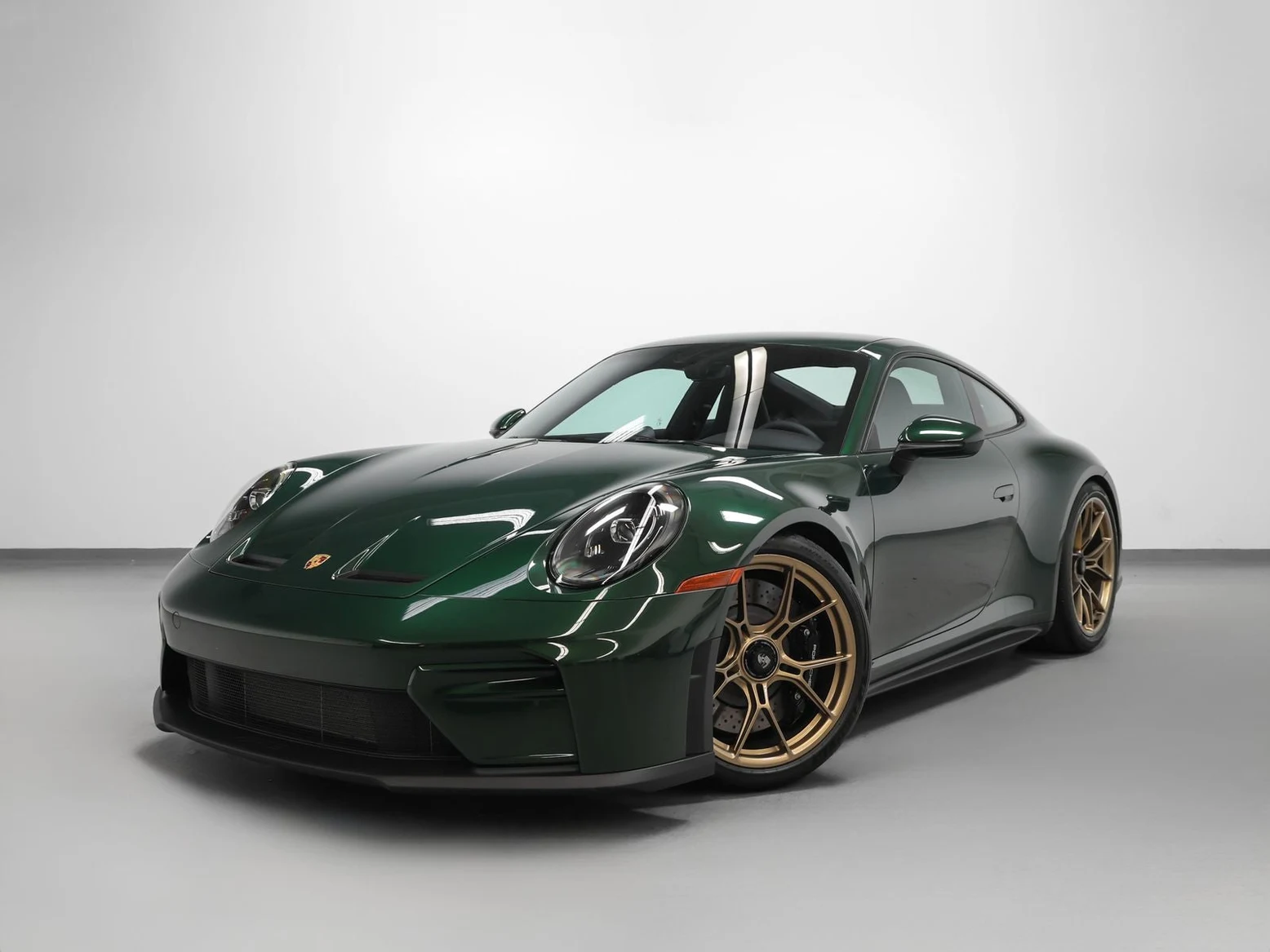 Porsche 911 GT3 Touring (992.2) · Oak Green Metallic Neo · Indigo Auto Group