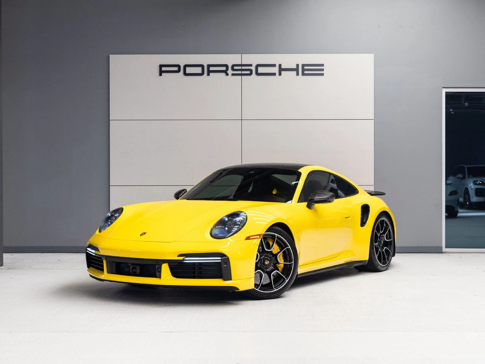 Porsche 911 Turbo S (992.1) · Racing Yellow · Indigo Auto Group