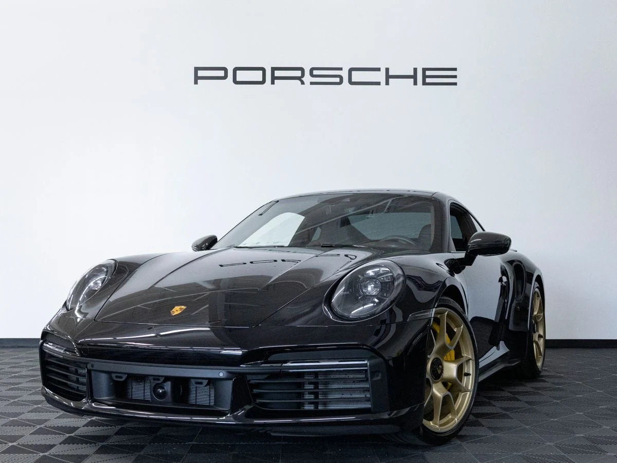 Porsche 911 Turbo S (992.1) · Jet Black Metallic · Indigo Auto Group