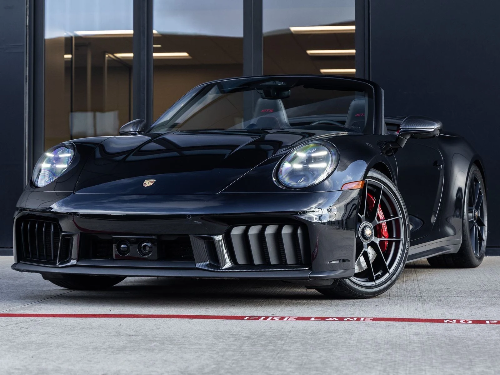 Porsche 911 Carrera 4 GTS Cabriolet (992.2) · Jet Black Metallic · Indigo Auto Group