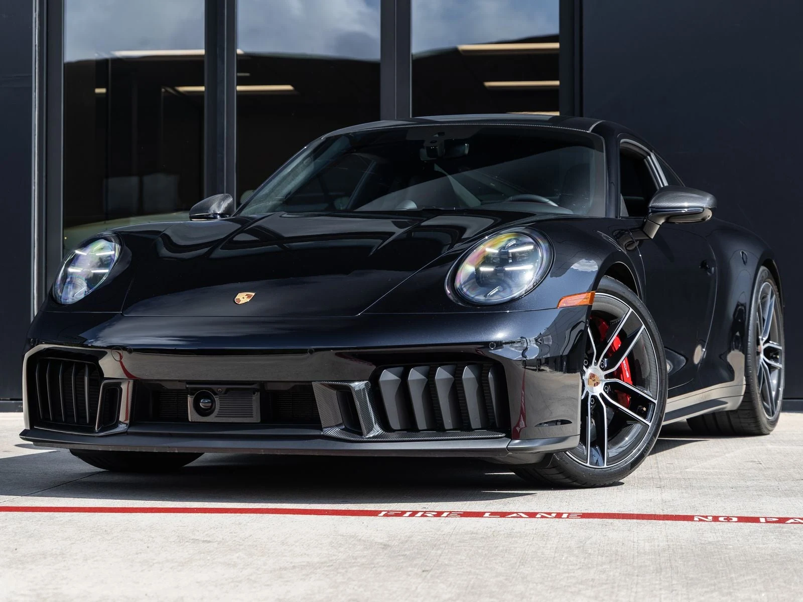 Porsche 911 Carrera GTS (992.2) · Jet Black Metallic · Indigo Auto Group
