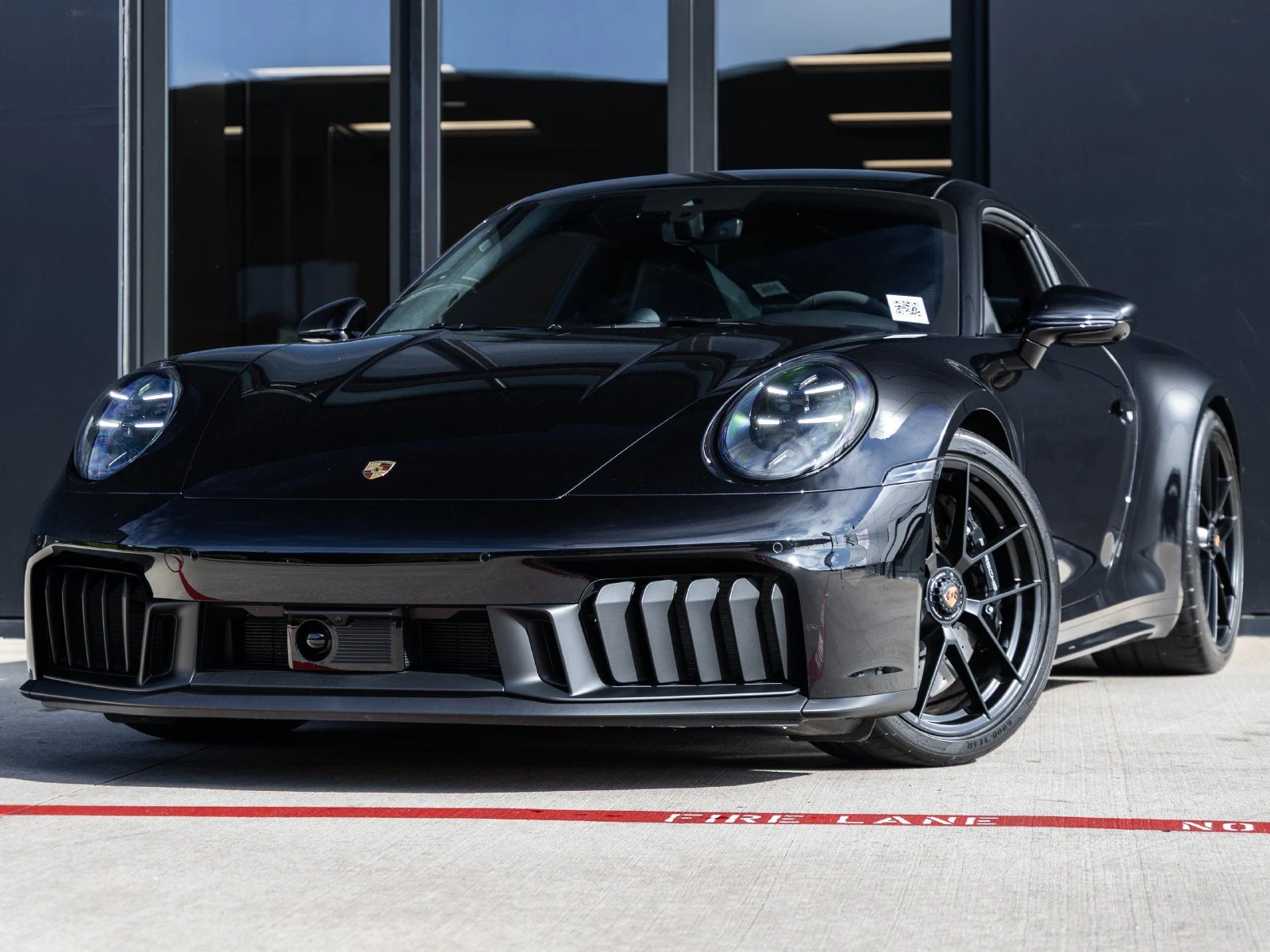 Porsche 911 Carrera 4 GTS (992.2) · Jet Black Metallic · Indigo Auto Group
