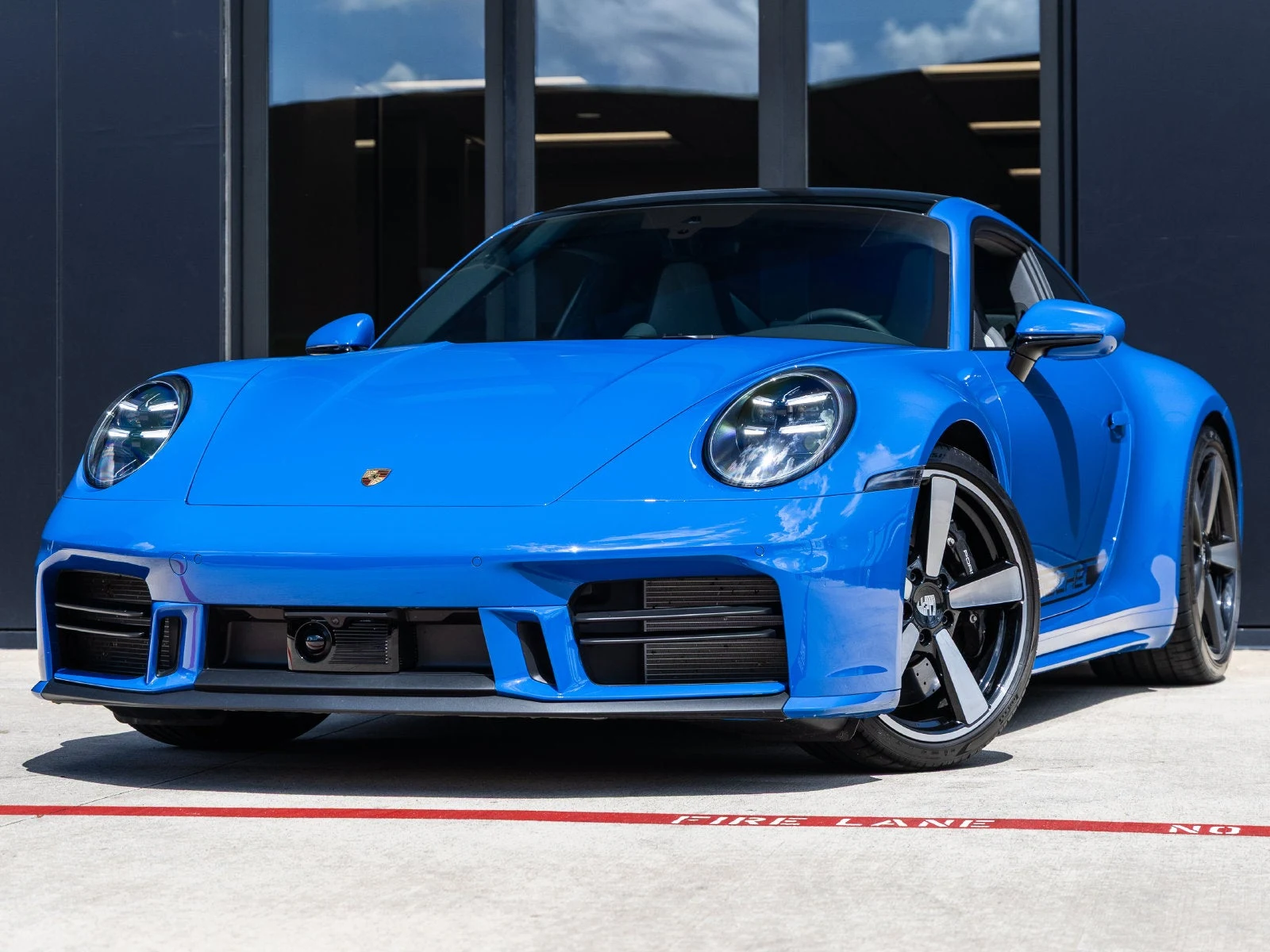 Porsche 911 Carrera 4S (992.2) · Lugano Blue · Indigo Auto Group