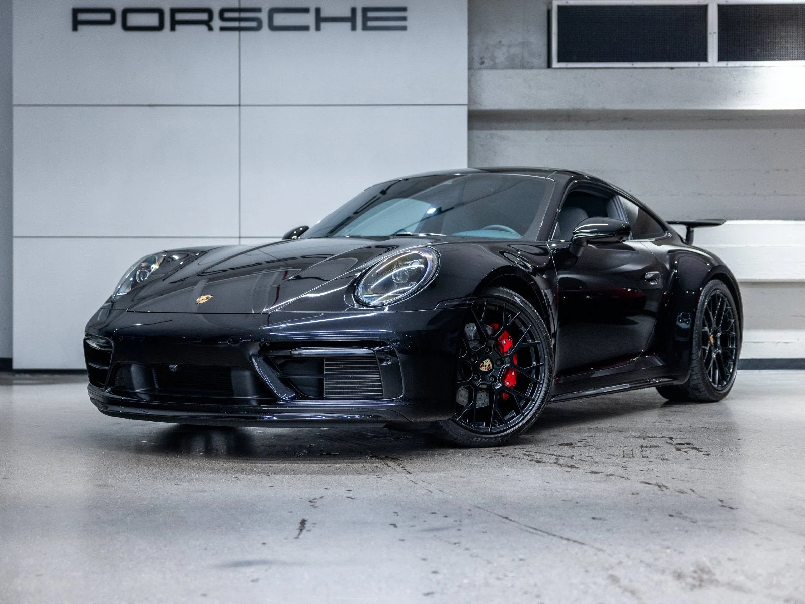 Porsche 911 Carrera S (992.1) · Jet Black Metallic · Indigo Auto Group