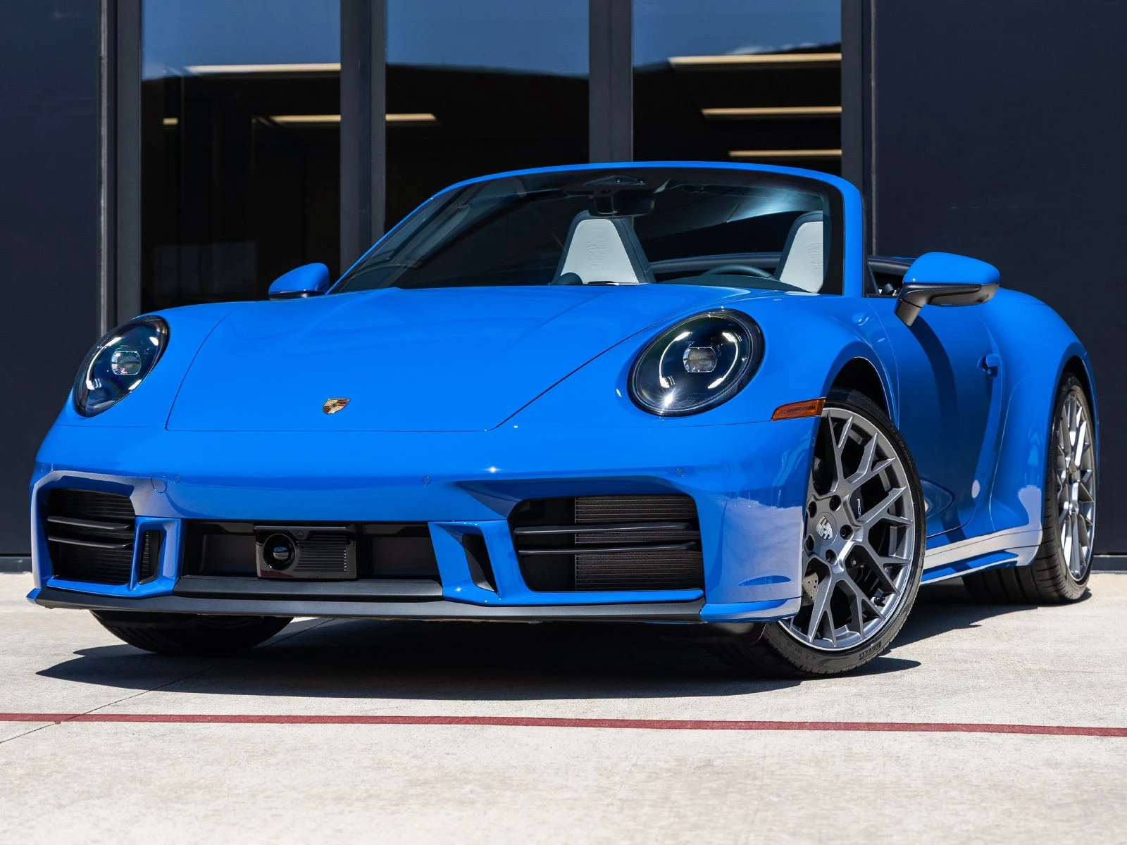 Porsche 911 Carrera Cabriolet (992.2) · Lugano Blue · Indigo Auto Group