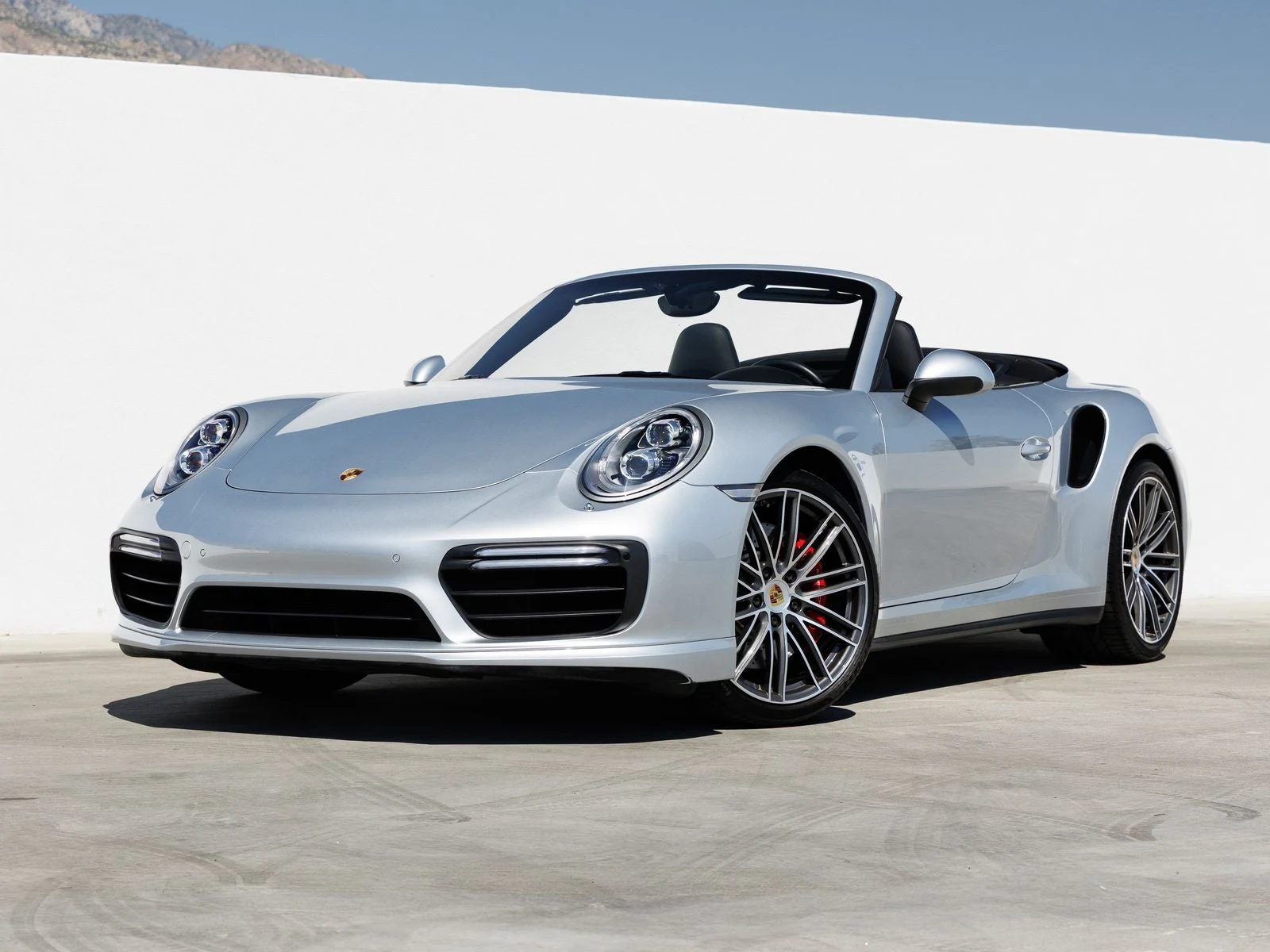 Porsche 911 Turbo Cabriolet (991.2) · Rhodium Silver Metallic · Indigo Auto Group