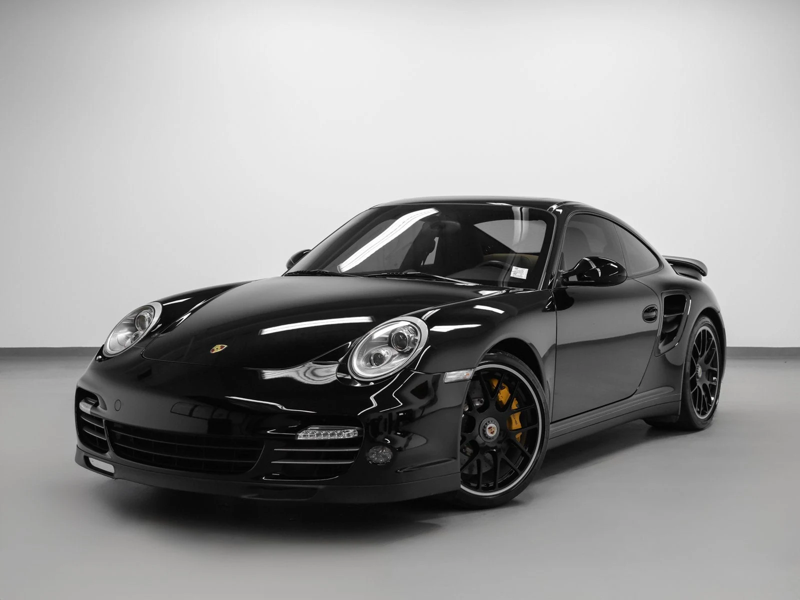 Porsche 911 Turbo S (997.2) · black · Indigo Auto Group