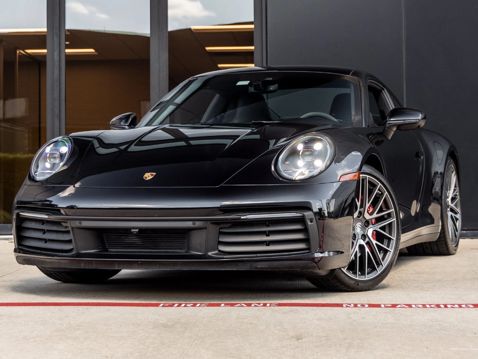 Porsche 911 Carrera S (992.1) · Jet Black Metallic · Indigo Auto Group