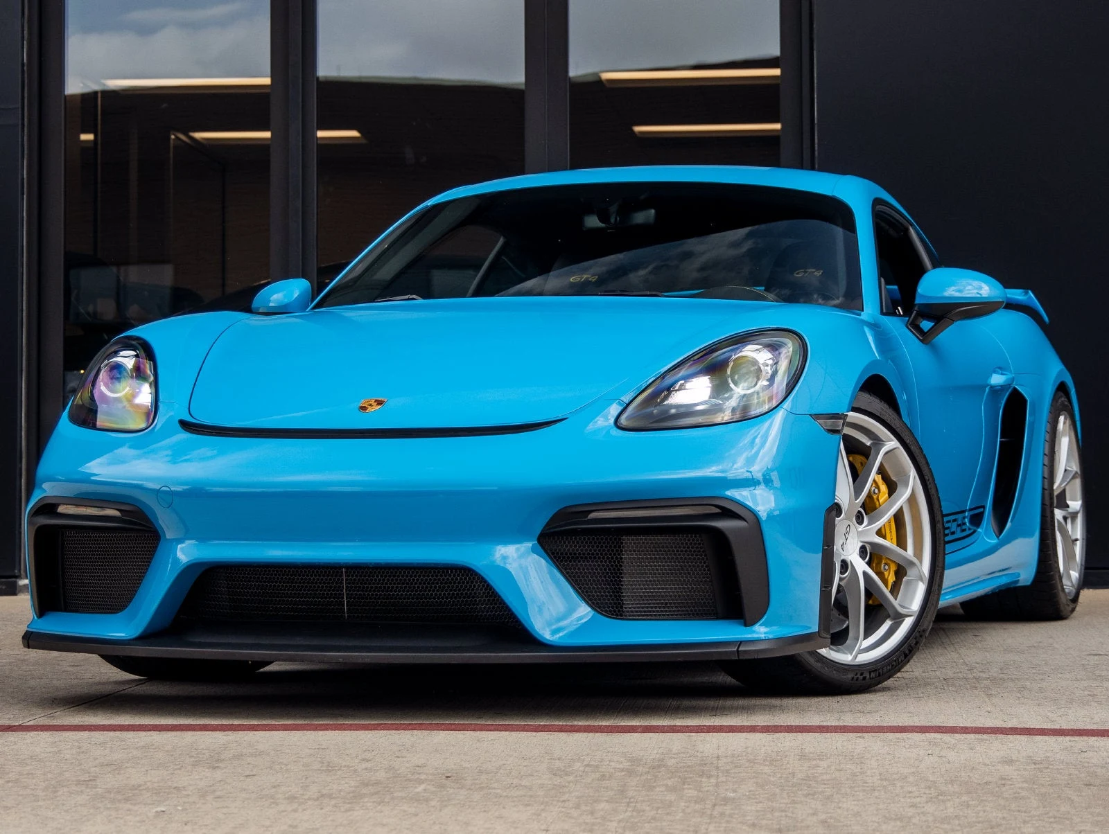 Porsche 718 Cayman GT4 · Preparation For Custom Color: Rivierablue · Indigo Auto Group