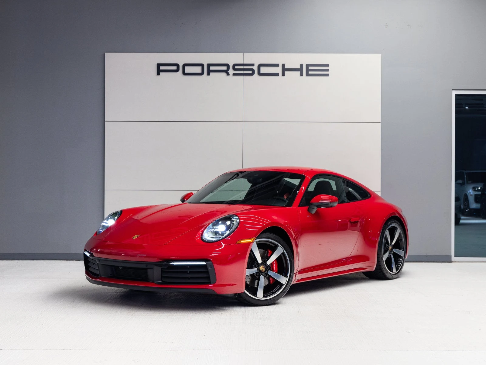 Porsche 911 Carrera S (992.1) · Carmine Red · Indigo Auto Group