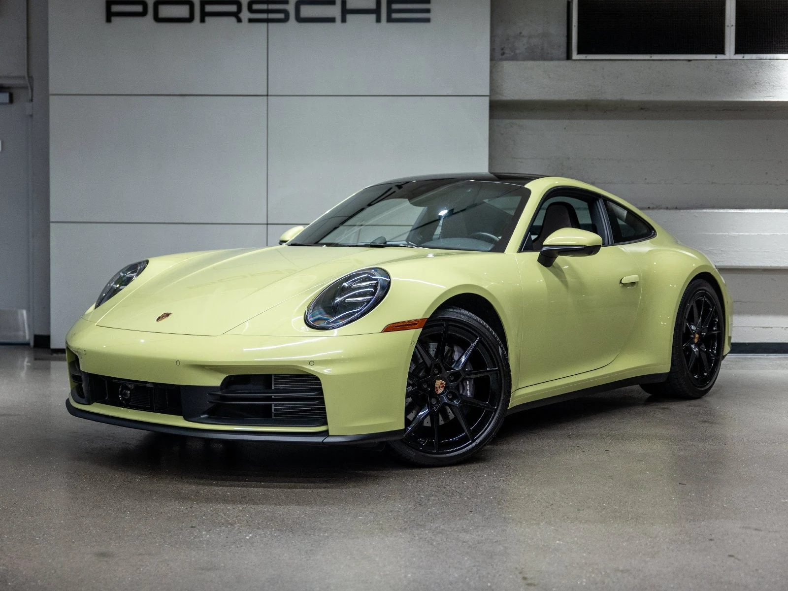 Porsche 911 Carrera (992.2) · Cartagena Yellow Metallic · Indigo Auto Group
