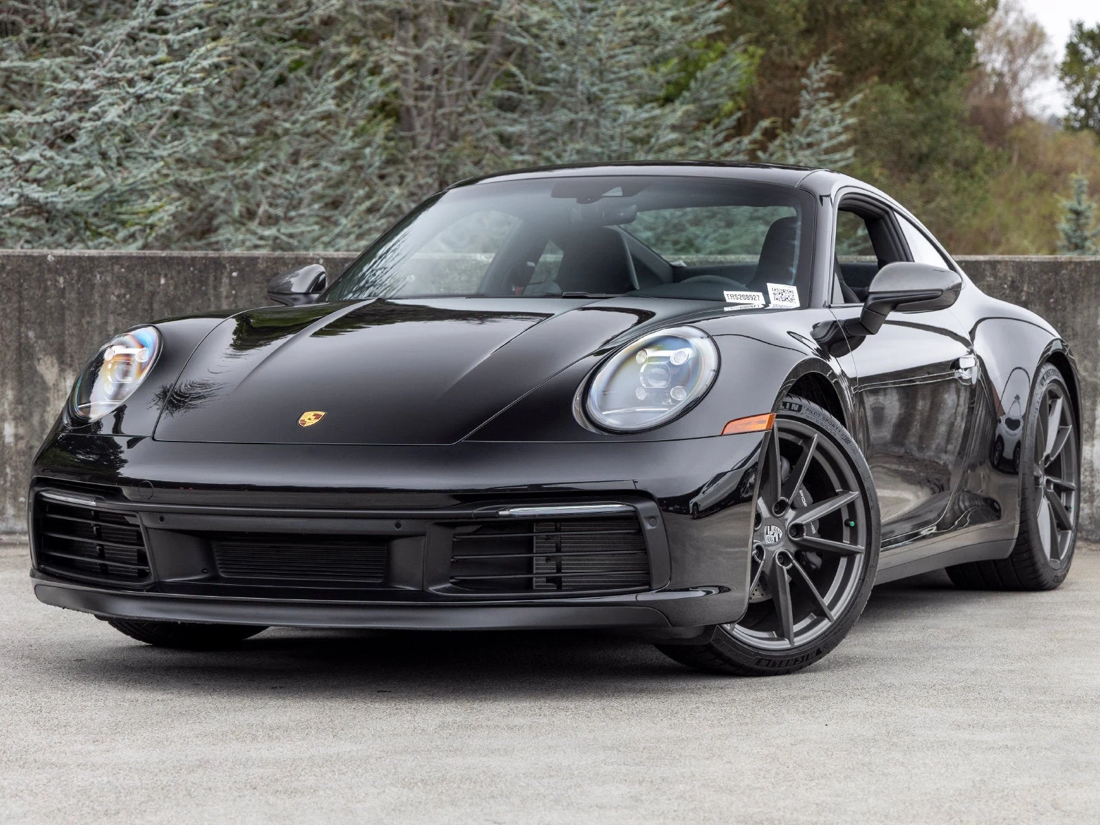 Porsche 911 Carrera T (992.1) · Jet Black Metallic · Indigo Auto Group