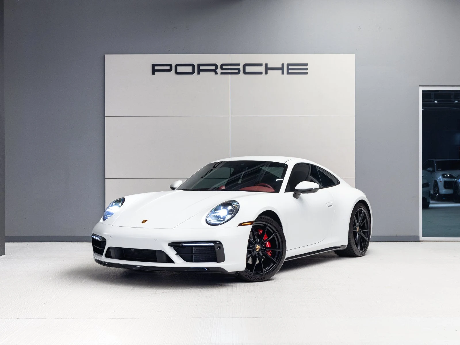 Porsche 911 Carrera (992.1) · white · Indigo Auto Group