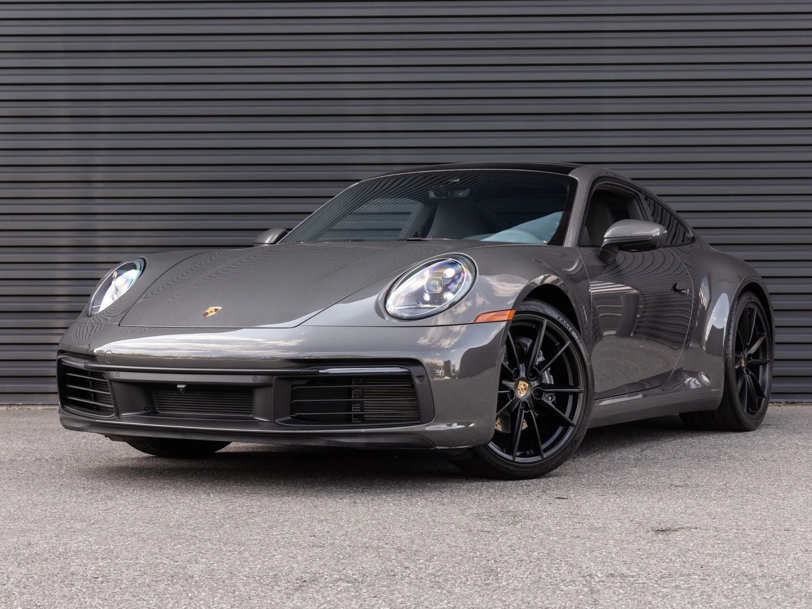 Porsche 911 Carrera (992.1) · Agate Grey Metallic · Indigo Auto Group
