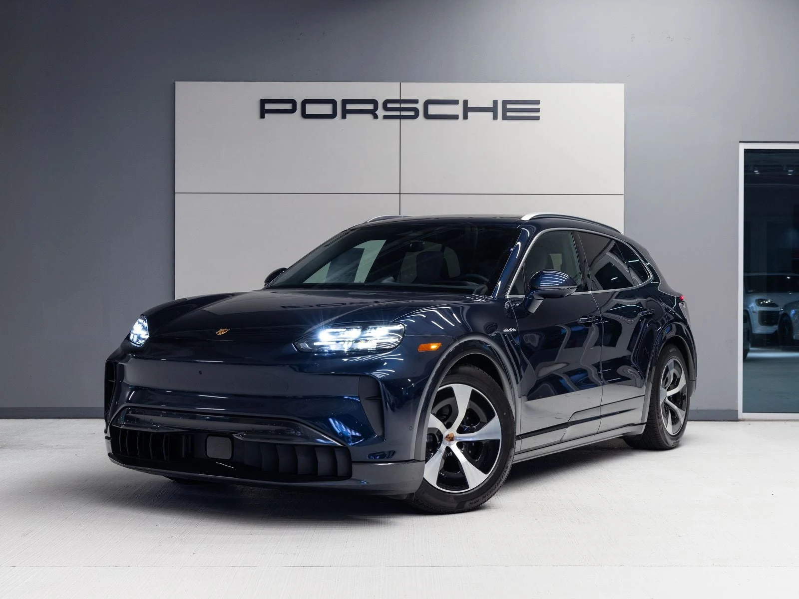 Porsche Cayenne Electric (E4) · Algarve Blue Metallic · Indigo Auto Group