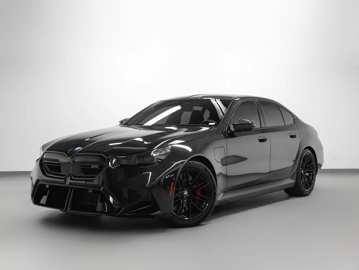 BMW M5 Sedan (G90) · Black Sapphire Metallic · Indigo Auto Group