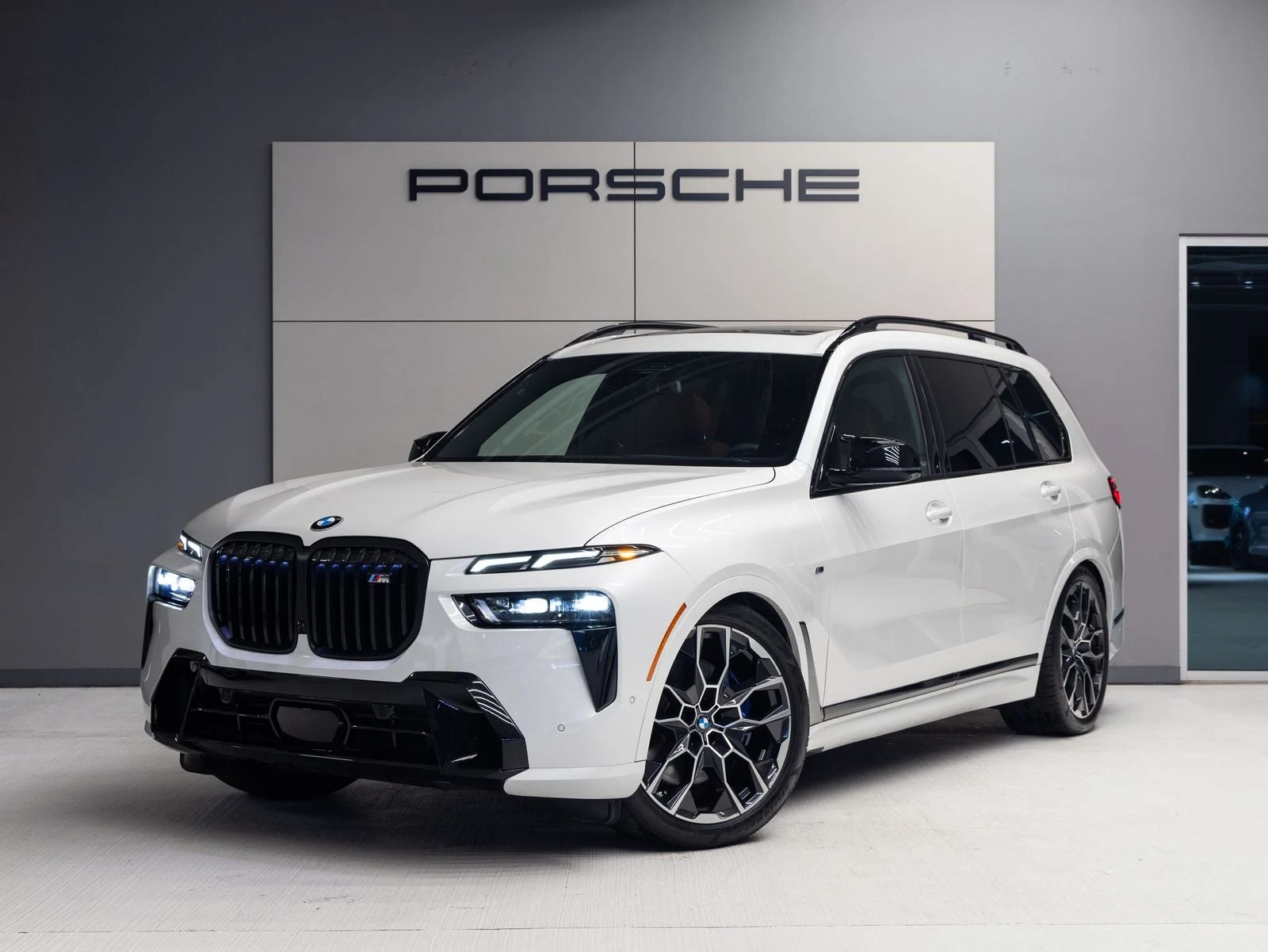 BMW X7 M60i (G07) · Mineral White Metallic · Indigo Auto Group