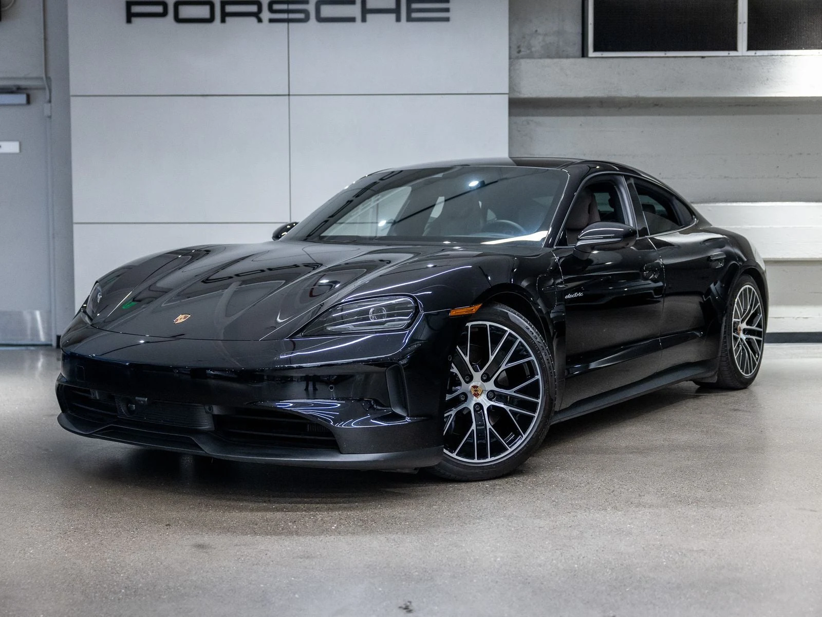 Porsche Taycan Sedan (2025 Update) · Jet Black Metallic · Indigo Auto Group