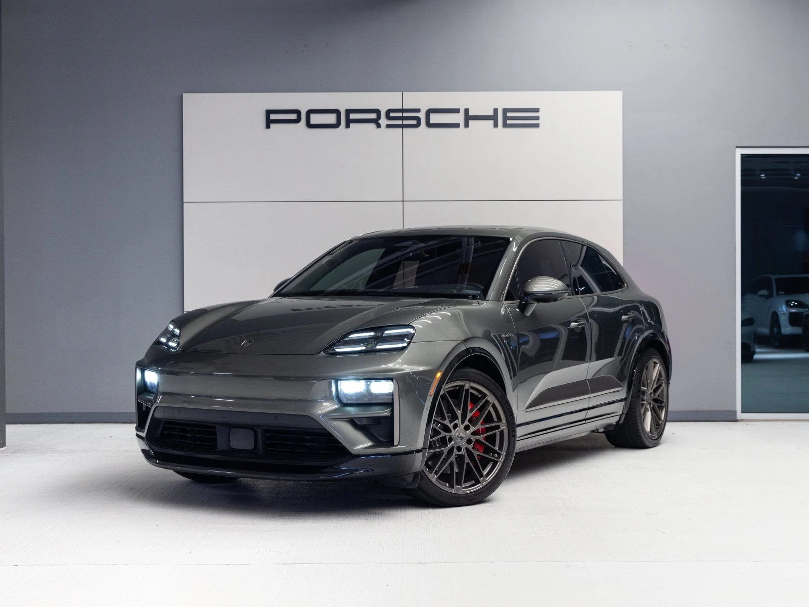 Porsche Macan Turbo Electric (XAB) · Aventurine Green Metallic · Indigo Auto Group