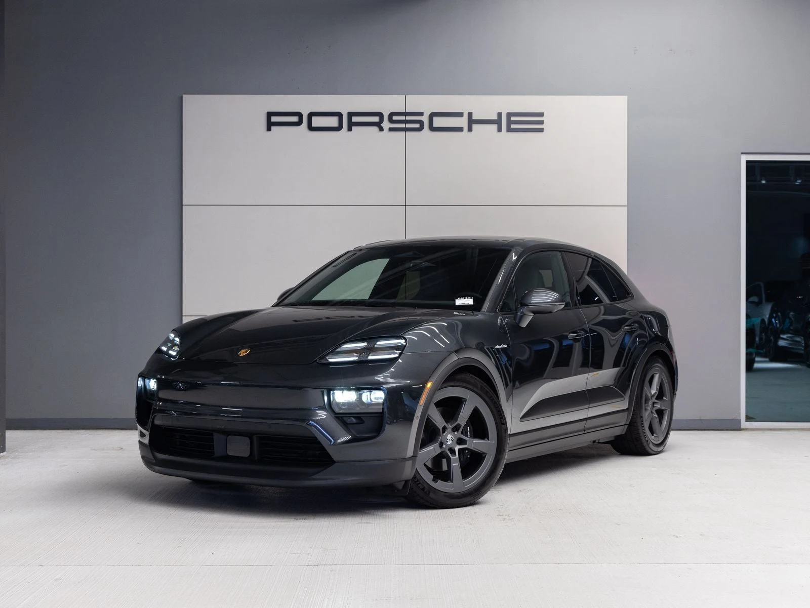 Porsche Macan 4 Electric (XAB) · Volcano Grey Metallic · Indigo Auto Group