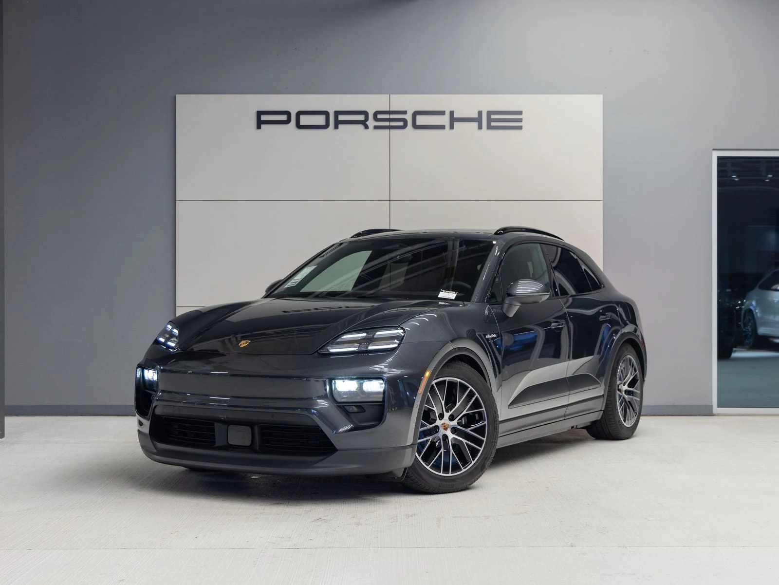 Porsche Macan 4 Electric (XAB) · Volcano Grey Metallic · Indigo Auto Group