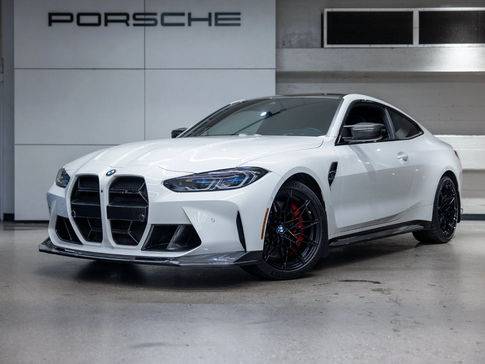 BMW M4 Competition Coupé (G82) · Alpine White · Indigo Auto Group