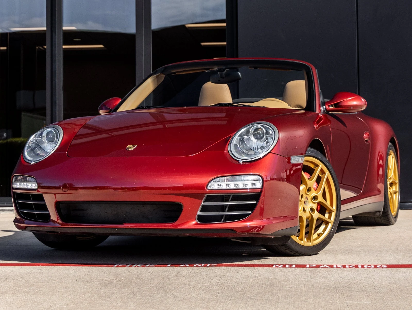 Porsche 911 Carrera 4S Cabriolet (997.2) · Ruby Red Metallic · Indigo Auto Group