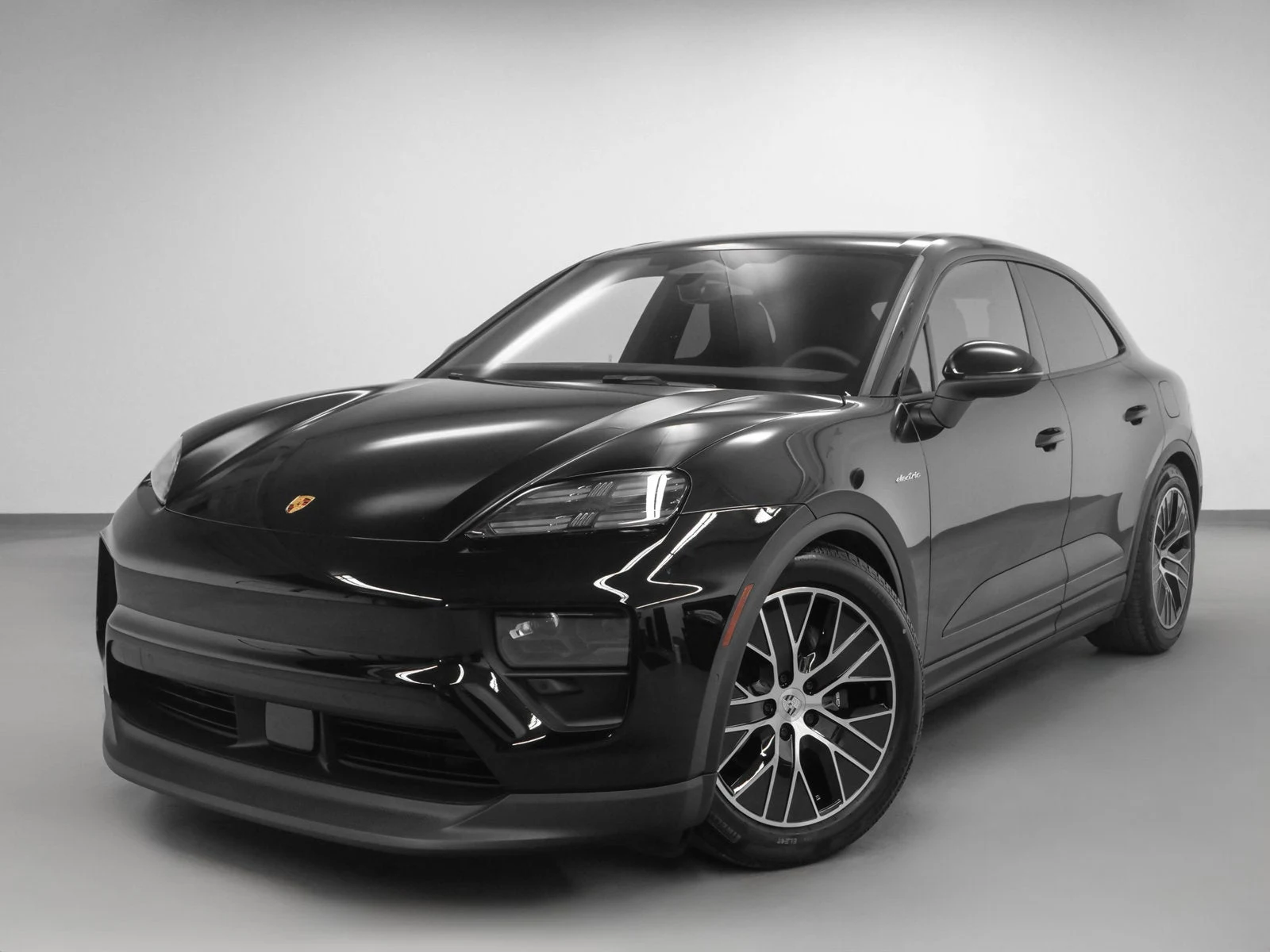 Porsche Macan Electric (XAB) · black · Indigo Auto Group