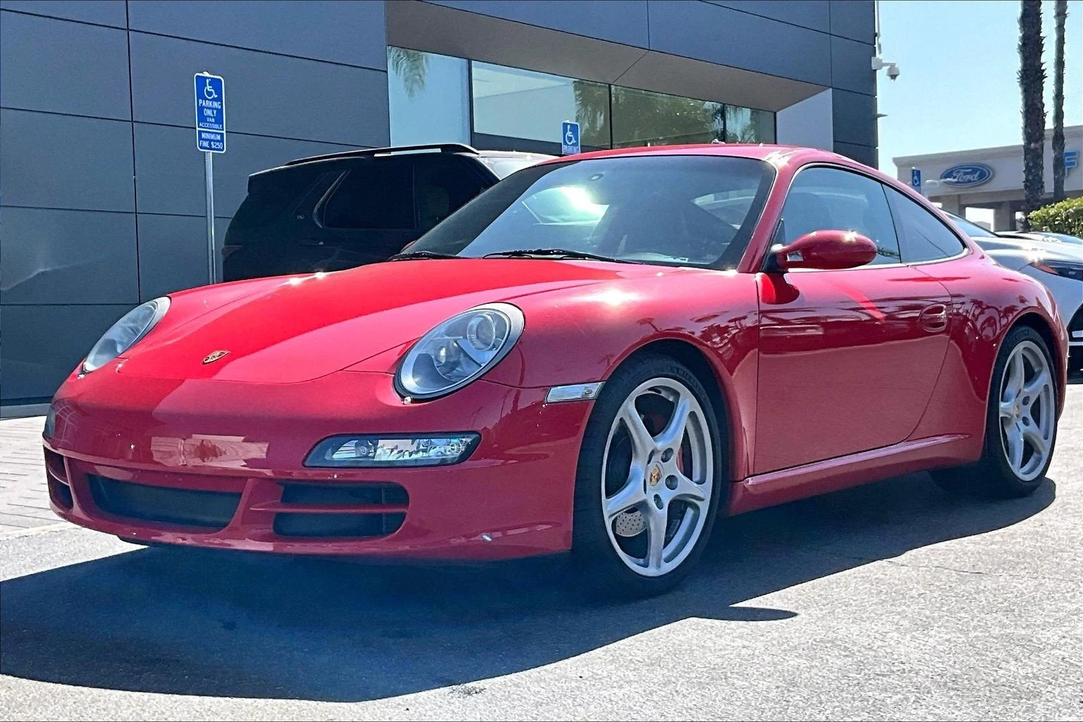 Porsche 911 Carrera S (997.1) · Guards Red · Indigo Auto Group