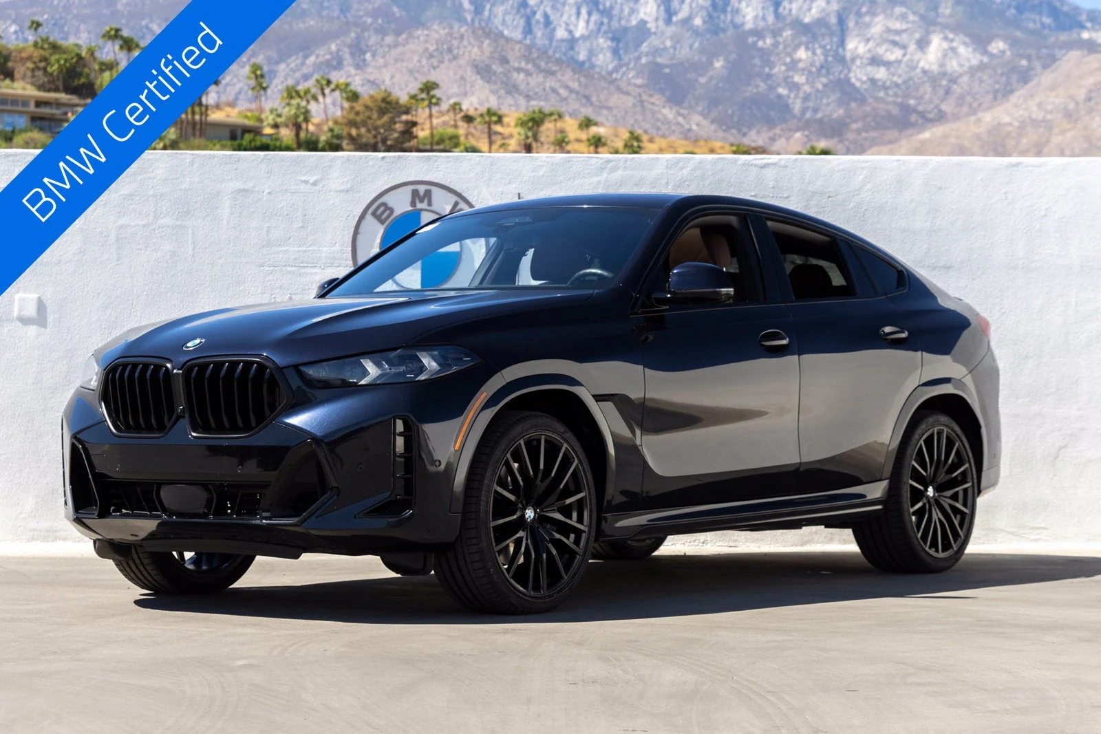 BMW X6 xDrive40i (G06) · Carbon Black Metallic · Indigo Auto Group