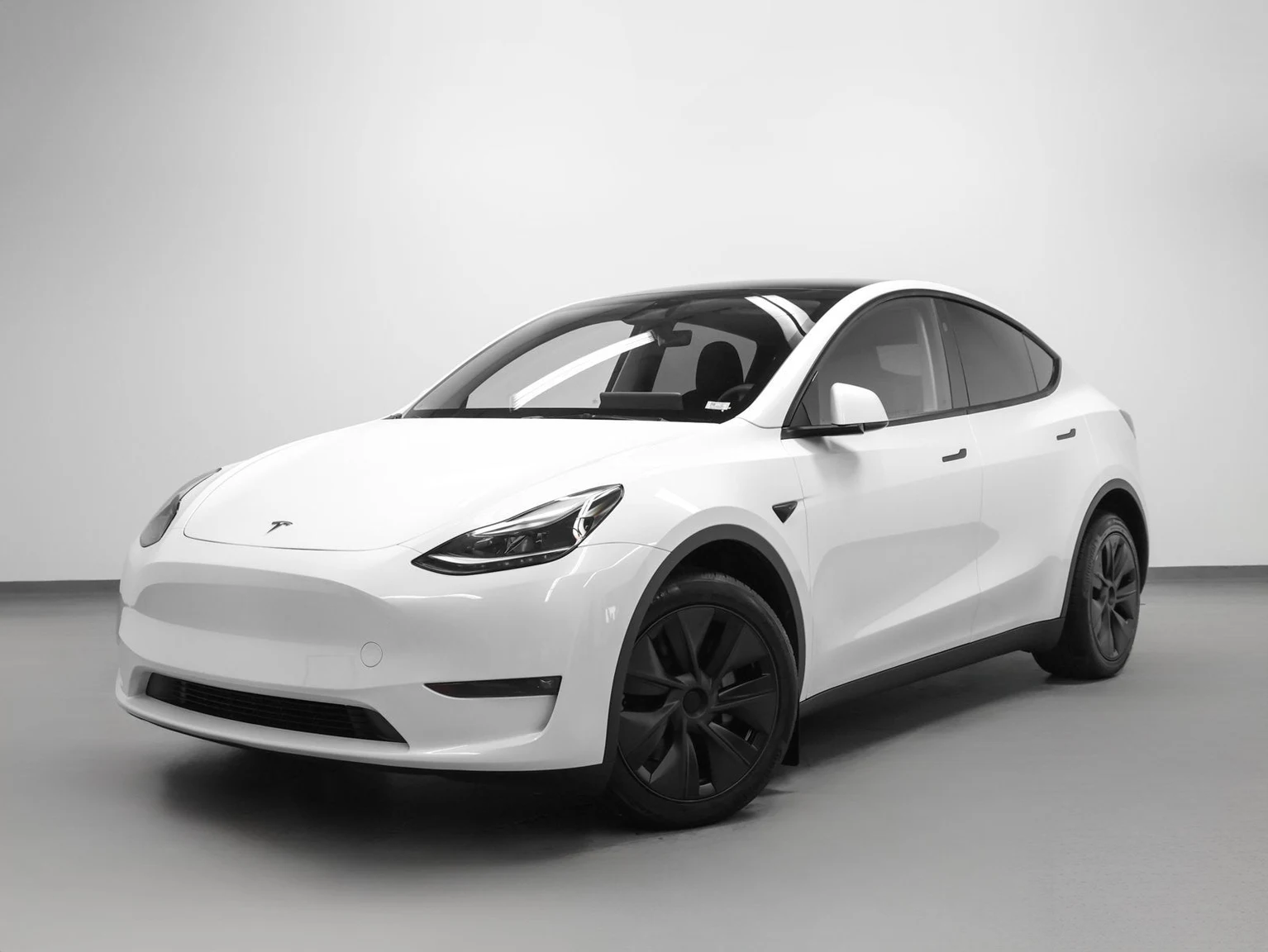 Tesla Model Y Long Range (Original Version) · Pearl White Multi-Coat · Indigo Auto Group