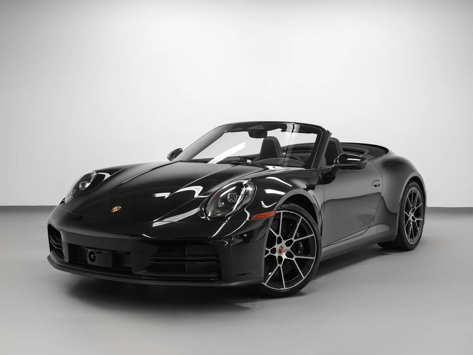 Porsche 911 (992.2) Carrera S Cabriolet · Jet Black Metallic · Indigo Auto Group