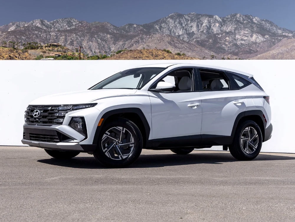 Hyundai Tucson Hybrid SE (2025 Update) · Creamy White Pearl · Indigo Auto Group