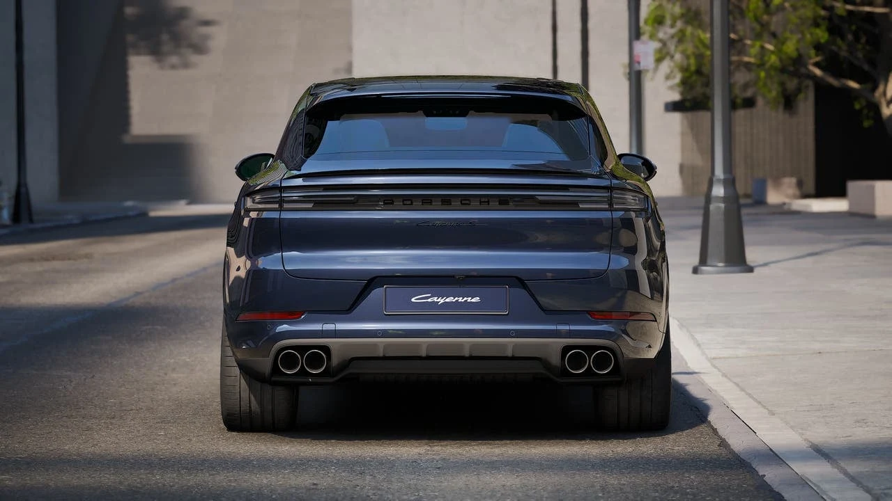 2026 Porsche Cayenne S Coupé, rear three-quarter view, Algarve Blue Metallic