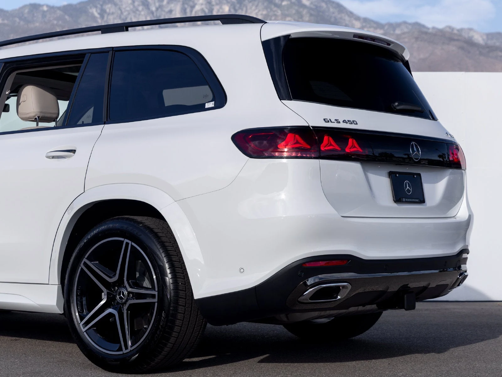 2027 Mercedes-Benz GLS GLS 450 4MATIC®, rear three-quarter view, Polar White