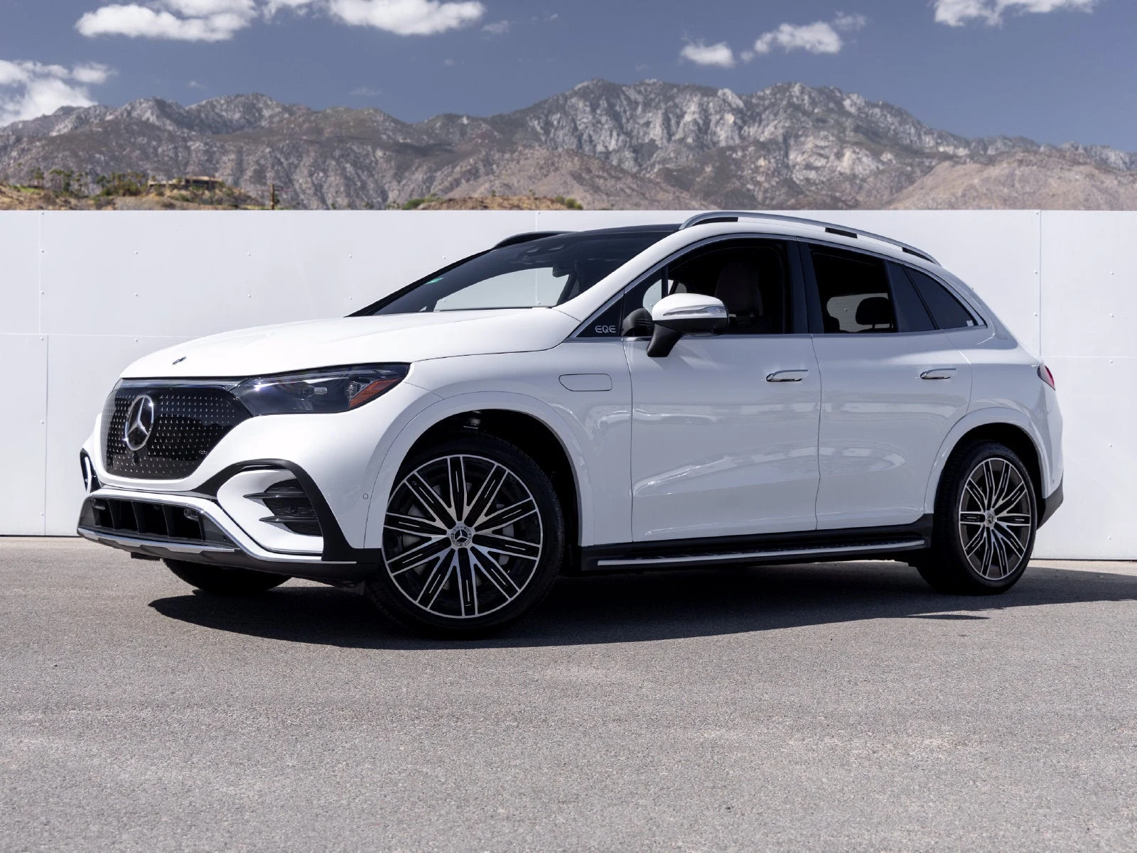 2027 Mercedes-Benz EQE 320+ SUV for sale, front three-quarter view, Manufaktur Moonlight White Metallic