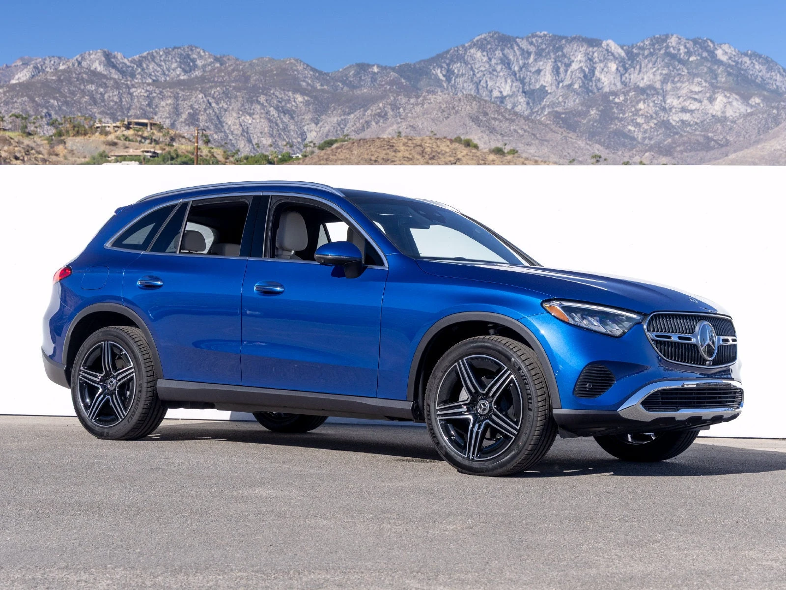 2027 Mercedes-Benz GLC GLC 300 for sale, front three-quarter view, Starling Blue Metallic