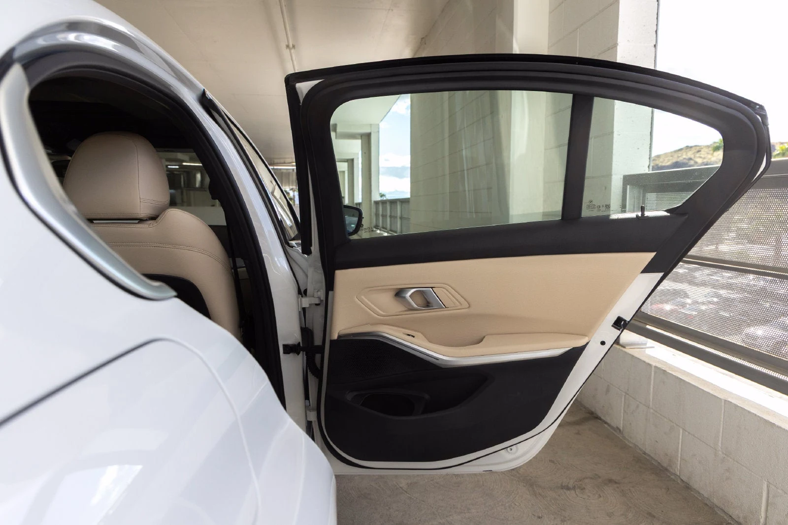 2026 BMW 330i Sedan interior, door panel, Canberra Beige Perforated Sensatec